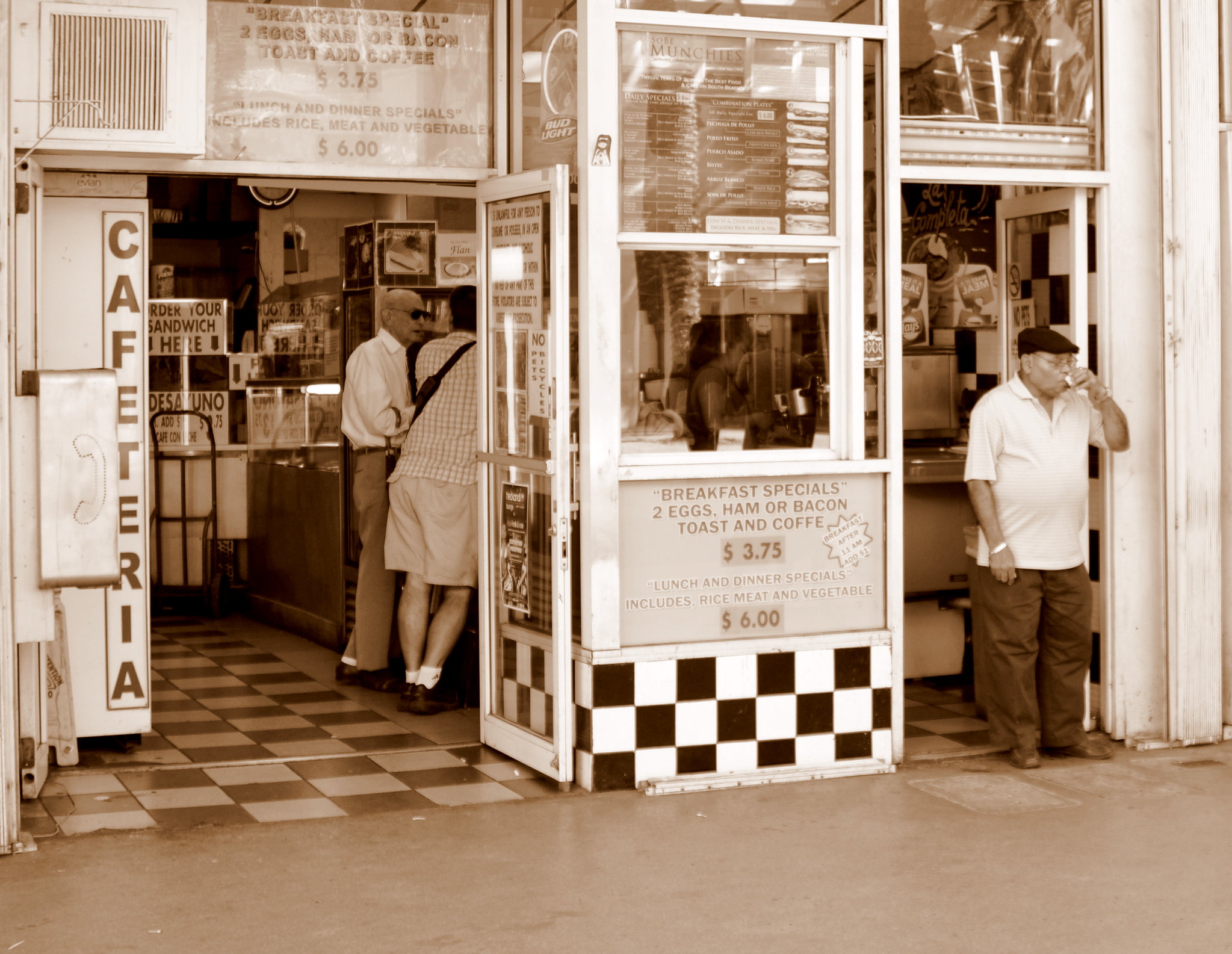A sepia cafeteria window counter with a checkered floor